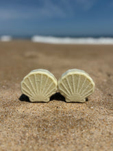 Two Seashell Bath Bombs on a beach
